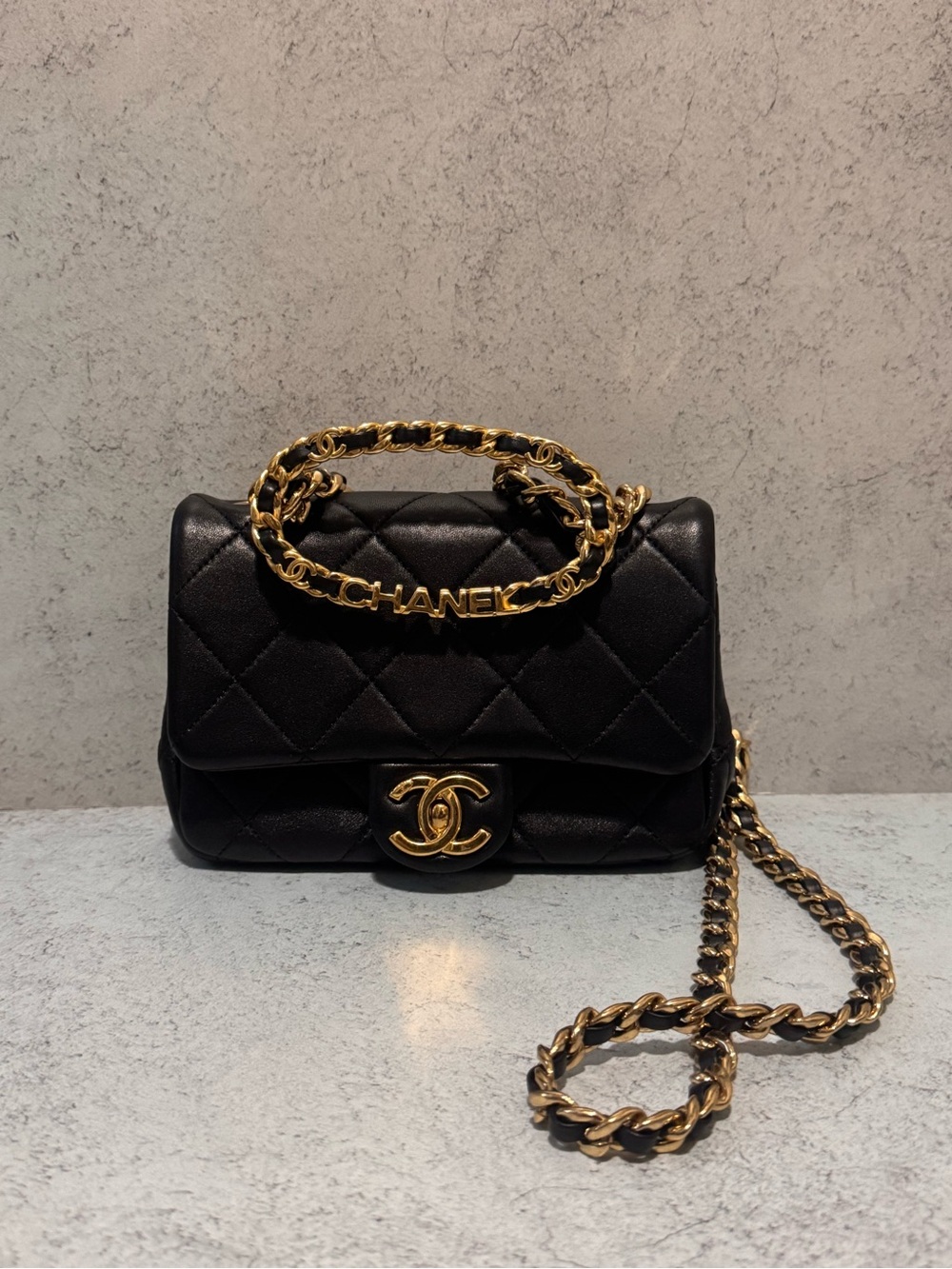 CHANEL Black Quilted Leather Shoulder Bag with Gold Hardware